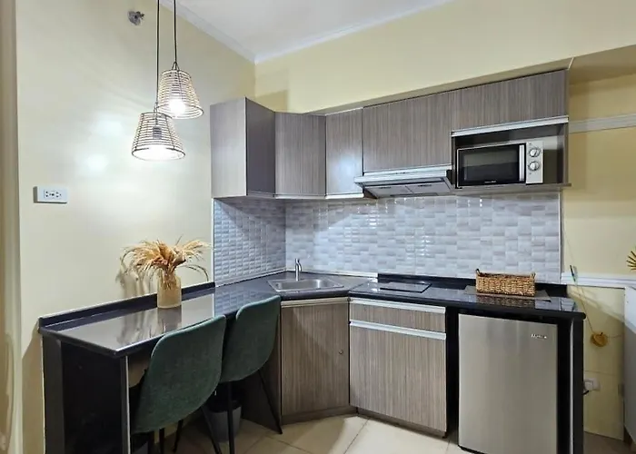 Апарт-отель Cozynest In Avida Riala It Park T2, Pool,fast Wifi 4*